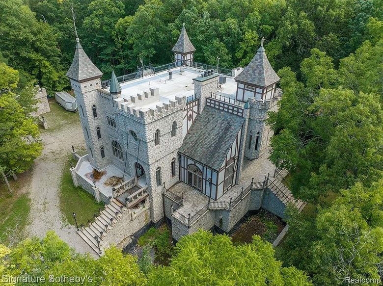 suburban men dream house michigan medieval castle with drawbridge secret rooms 20230503 131